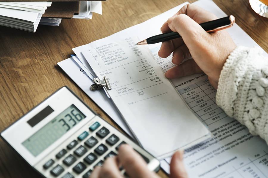 person doing calculations