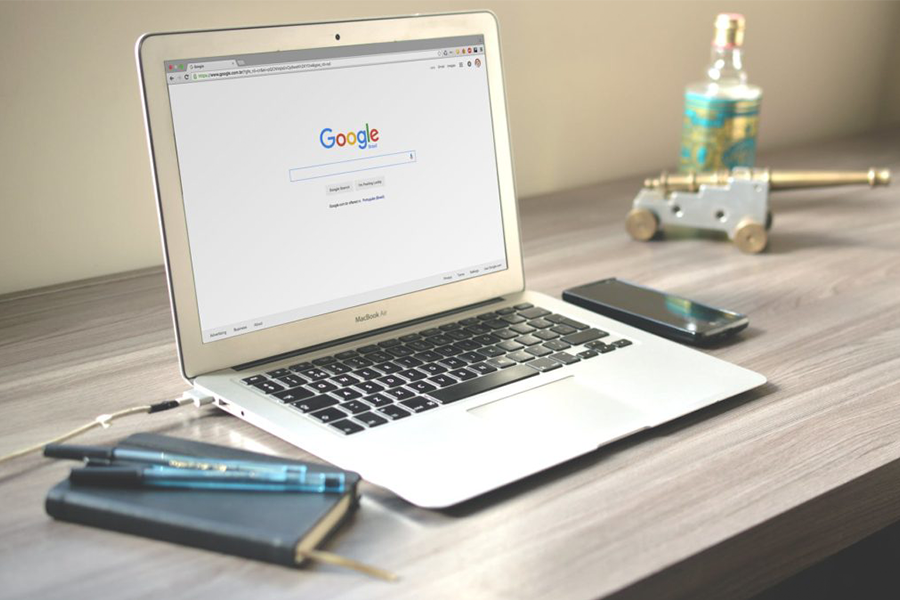 laptop with google search on screen