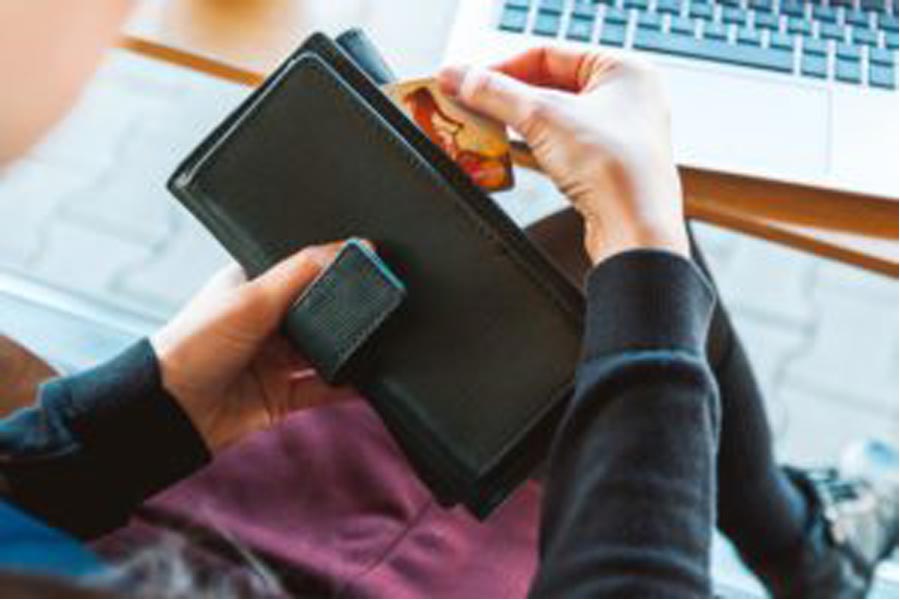 lady getting money on her wallet