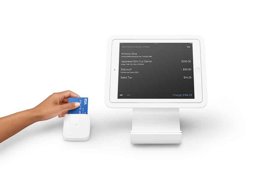 Swiping a card on Square Reader.