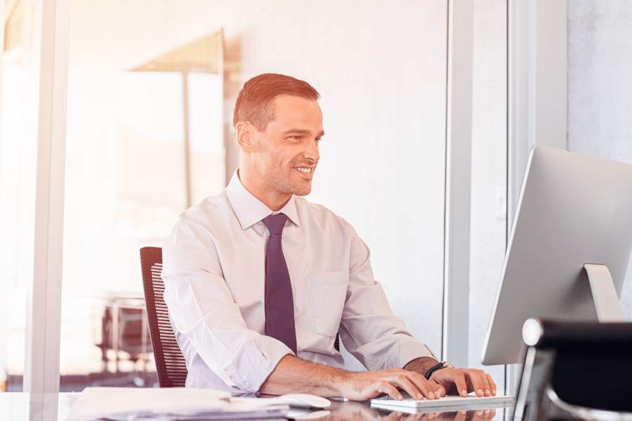 Young man working in his office