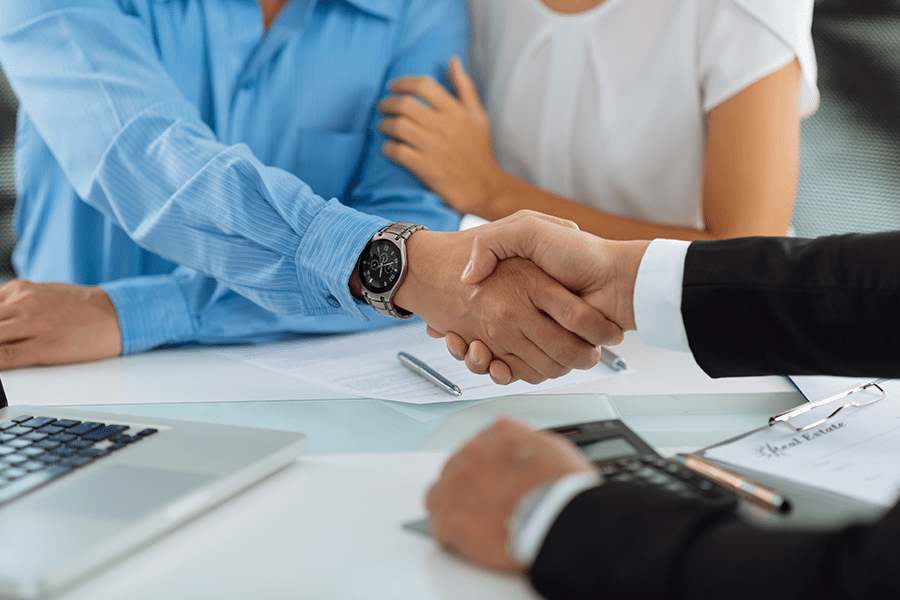 Two men having a handshake.
