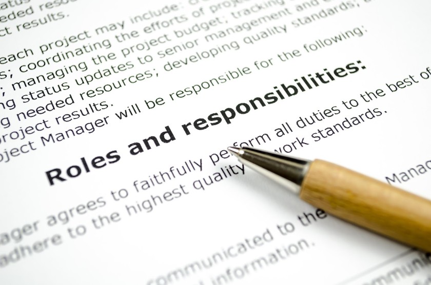 Roles and responsibilities written with pen.