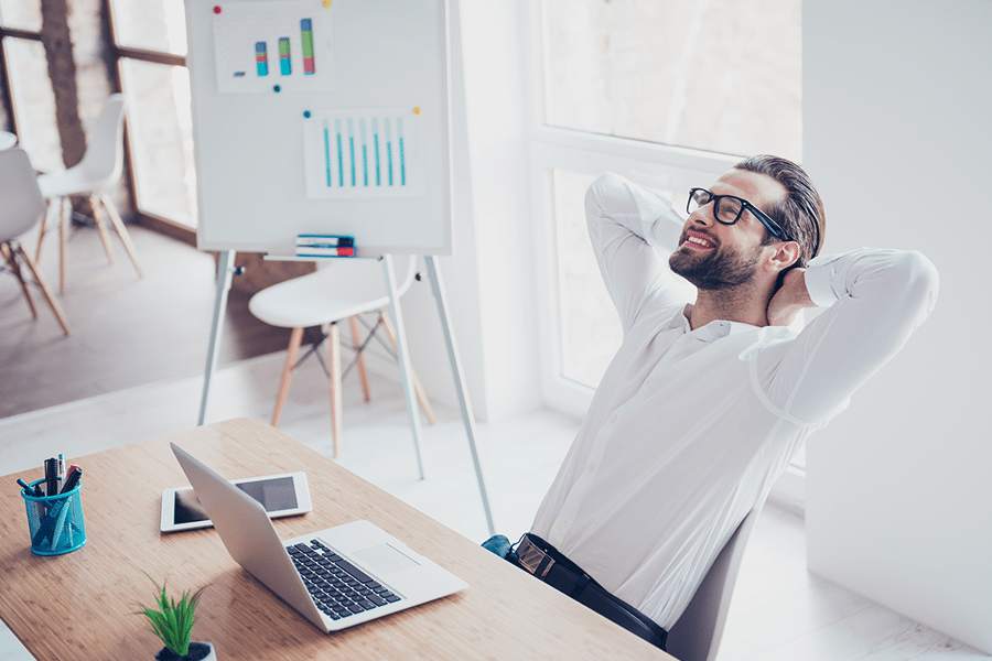 Businessman using office gadgets