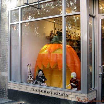 Little Marc Jacobs store Halloween window display with a large jack-o'-lantern.