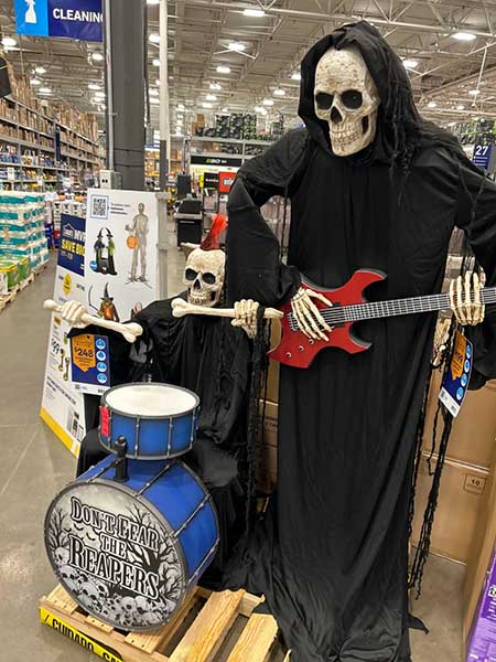 Skeletons arranged in a musical band display with instruments.